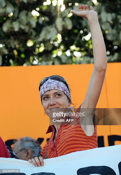 Picture taken on June 25, 2011 in the French southwestern town of Bayonne shows French Basque separatist activist Aurore Martin waving during a rally...