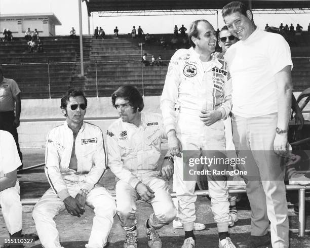 September 1, 1969: DeWayne “Tiny” Lund joins his fellow NASCAR Cup drivers Bobby Johns, Dick Brooks and Dave Marcis on pit road prior to the start of...