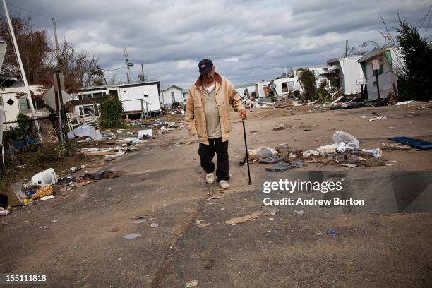 Man who identified himself as "Joe" surveys the damage done to Paradise Park trailer park by Superstorm Sandy on November 1, 2012 in Highlands, New...