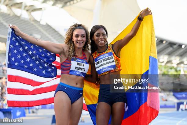 Karen Palomeque of Colombia celebrates with Jaleen Roberts of the United States after winning the Women's 200m T37 Final during day ten of the Para...