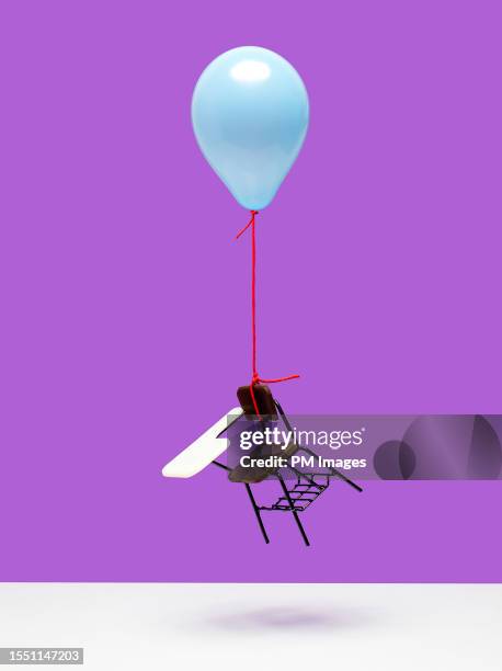 balloon carrying school desk - education concept - abandoned school stock pictures, royalty-free photos & images
