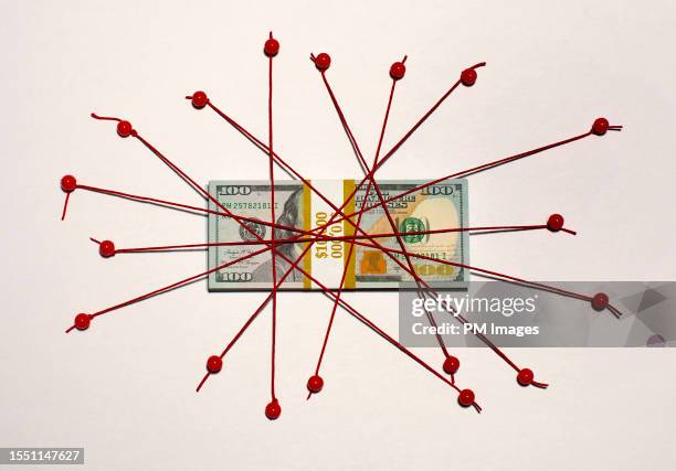 tied up money - gierig stockfoto's en -beelden