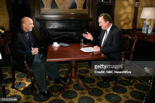 Pictured: Afghan President Hamid Karzai, NBC News' Tim Russert on September 19, 2006 --