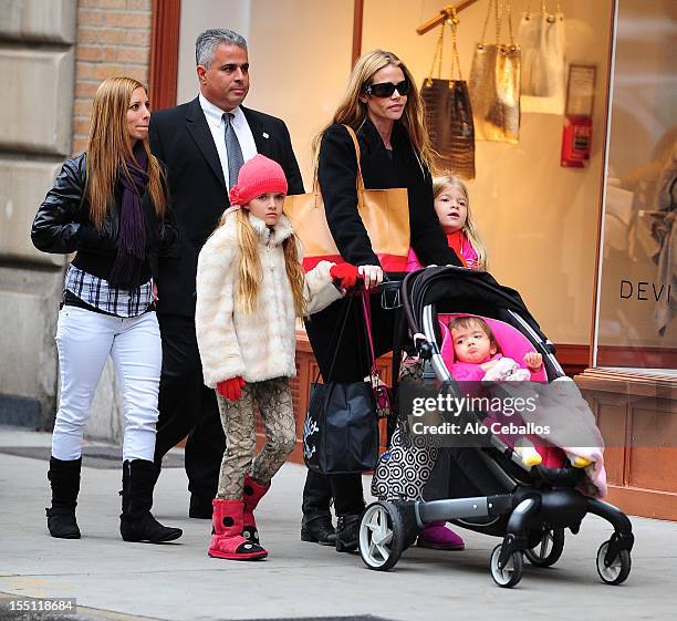 Denise Richards, Sam Sheen, Eloise Joni Richards and Lola Rose Sheen are seen on Madison Avenue on November 1, 2012 in New York City.