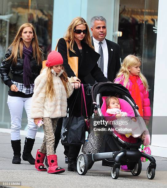 Denise Richards, Sam Sheen, Eloise Joni Richards and Lola Rose Sheen are seen on Madison Avenue on November 1, 2012 in New York City.