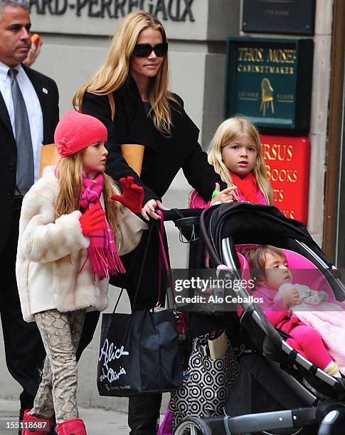 Denise Richards, Sam Sheen, Eloise Joni Richards and Lola Rose Sheen are seen on Madison Avenue on November 1, 2012 in New York City.