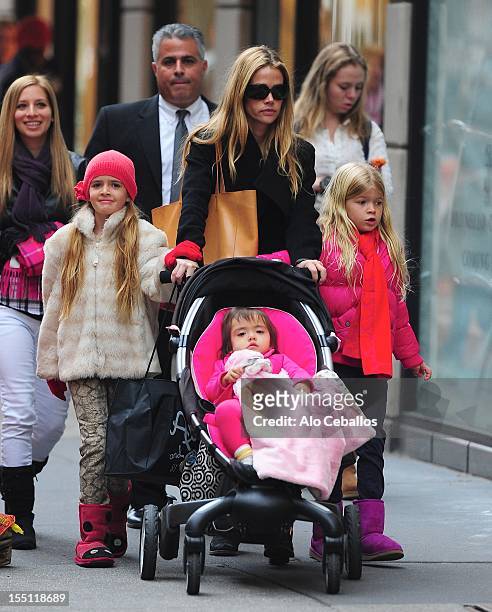 Denise Richards, Sam Sheen, Eloise Joni Richards and Lola Rose Sheen are seen on Madison Avenue on November 1, 2012 in New York City.