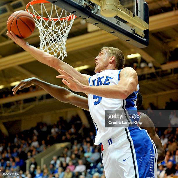 Mason Plumlee of the Duke Blue Devils goes to the hoop against the Winston-Salem State Rams at Cameron Indoor Stadium on November 1, 2012 in Durham,...