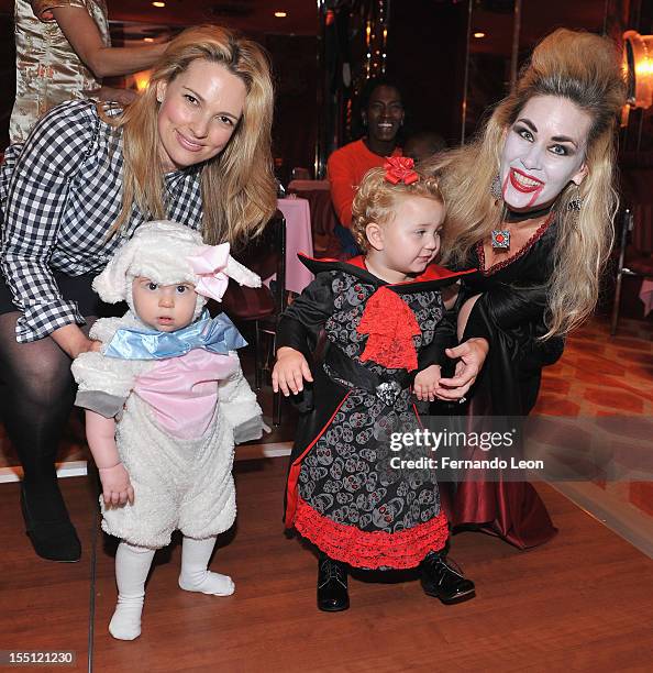 Ann Baker with her daughter Arielle, Michelle-Marie Heinemann with her daughter Hyacinth attend Hudson Cornelius Heinemann Celebrates His 6th...