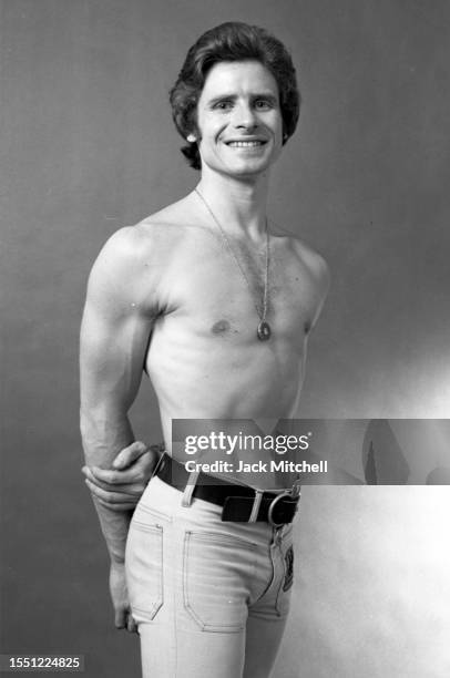 Portrait of shirtless Royal Ballet dancer David Wall, New York, New York, May 1974.