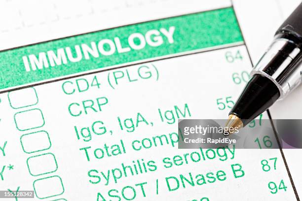 pen on immunology form for blood tests - treponema pallidum stock pictures, royalty-free photos & images
