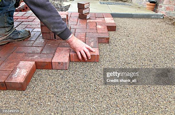 block paving drive getting layed - red brick apartments stock pictures, royalty-free photos & images