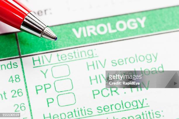 caneta vermelha em forma de virologia encomenda testes de vih - aids imagens e fotografias de stock