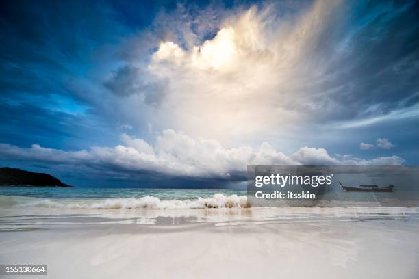 rain in the sea - dramatic sky stock pictures, royalty-free photos & images