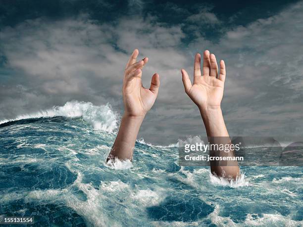 drowning person - tsunami wave stock pictures, royalty-free photos & images