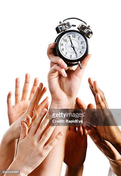 time to go home: many hands grab alarm clock - deadline contenders stock pictures, royalty-free photos & images