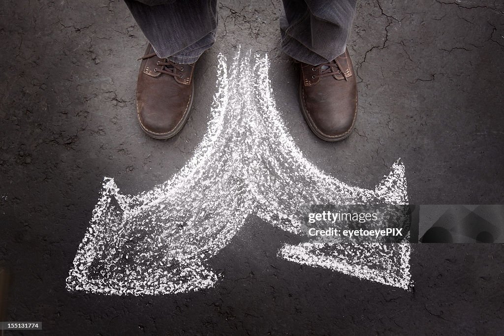 Standing Man with Two Choices (business)