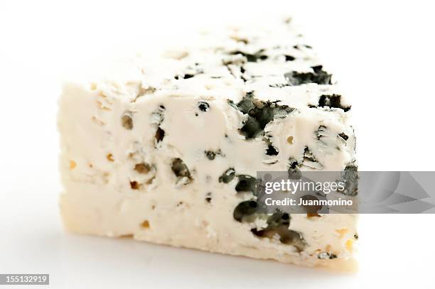 piece of french roquefort cheese - roquefort stock pictures, royalty-free photos & images