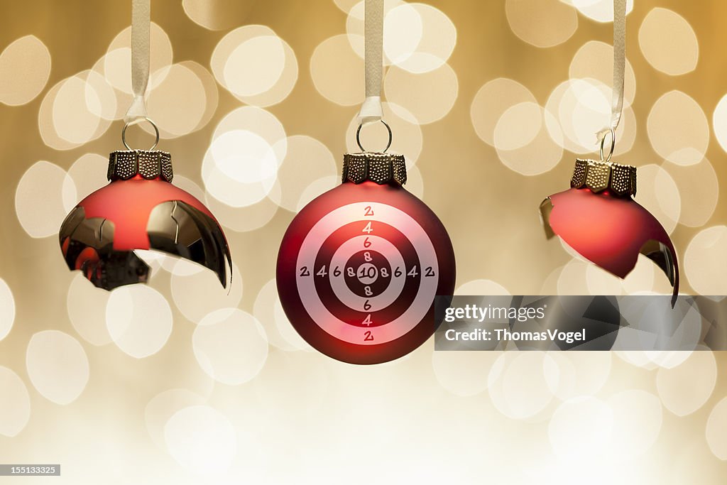 Anti Christmas concept - bauble target aiming broken