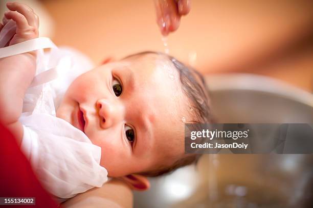 baptism: baby boy - baptism baby stock pictures, royalty-free photos & images