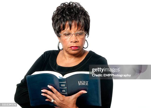 african american woman reading the bible isolated on white - black women in the bible stock pictures, royalty-free photos & images