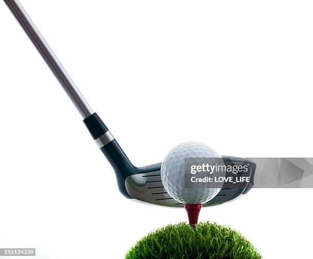golf club, ball and tee on grass - golfclub stockfoto's en -beelden