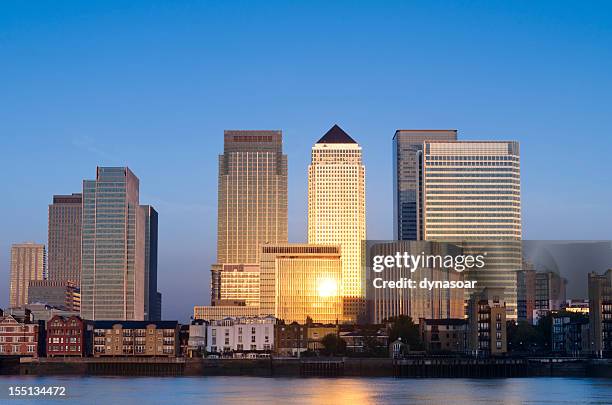 canary wharf skyscrapers sunrise, london - canada tower stock pictures, royalty-free photos & images