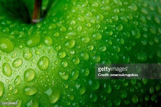 mela verde dettaglio - macrofotografia foto e immagini stock