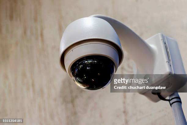 cctv security surveillance camera in building - security cameras stock pictures, royalty-free photos & images