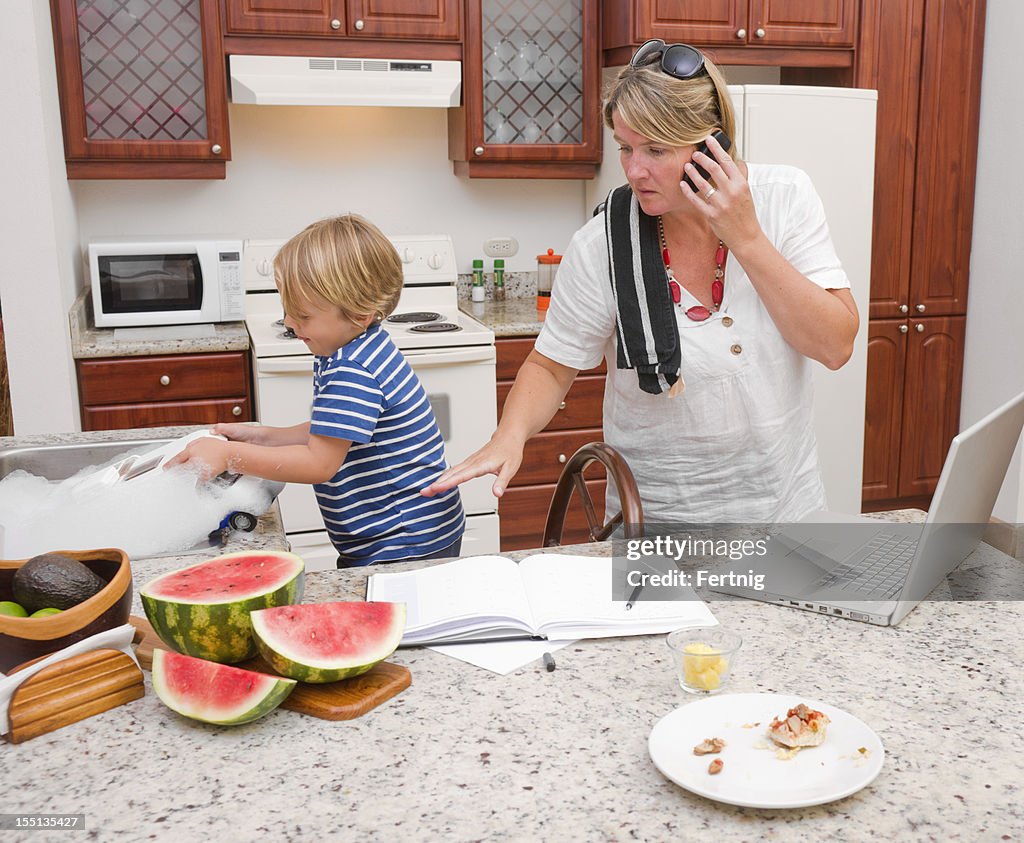 Multi-tasking mother at home