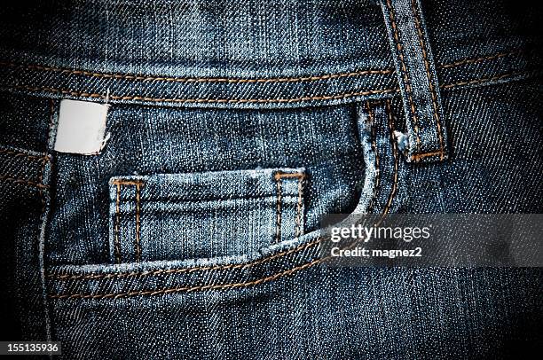 the stitched front pocket of a pair of denim jeans - pocket stock pictures, royalty-free photos & images