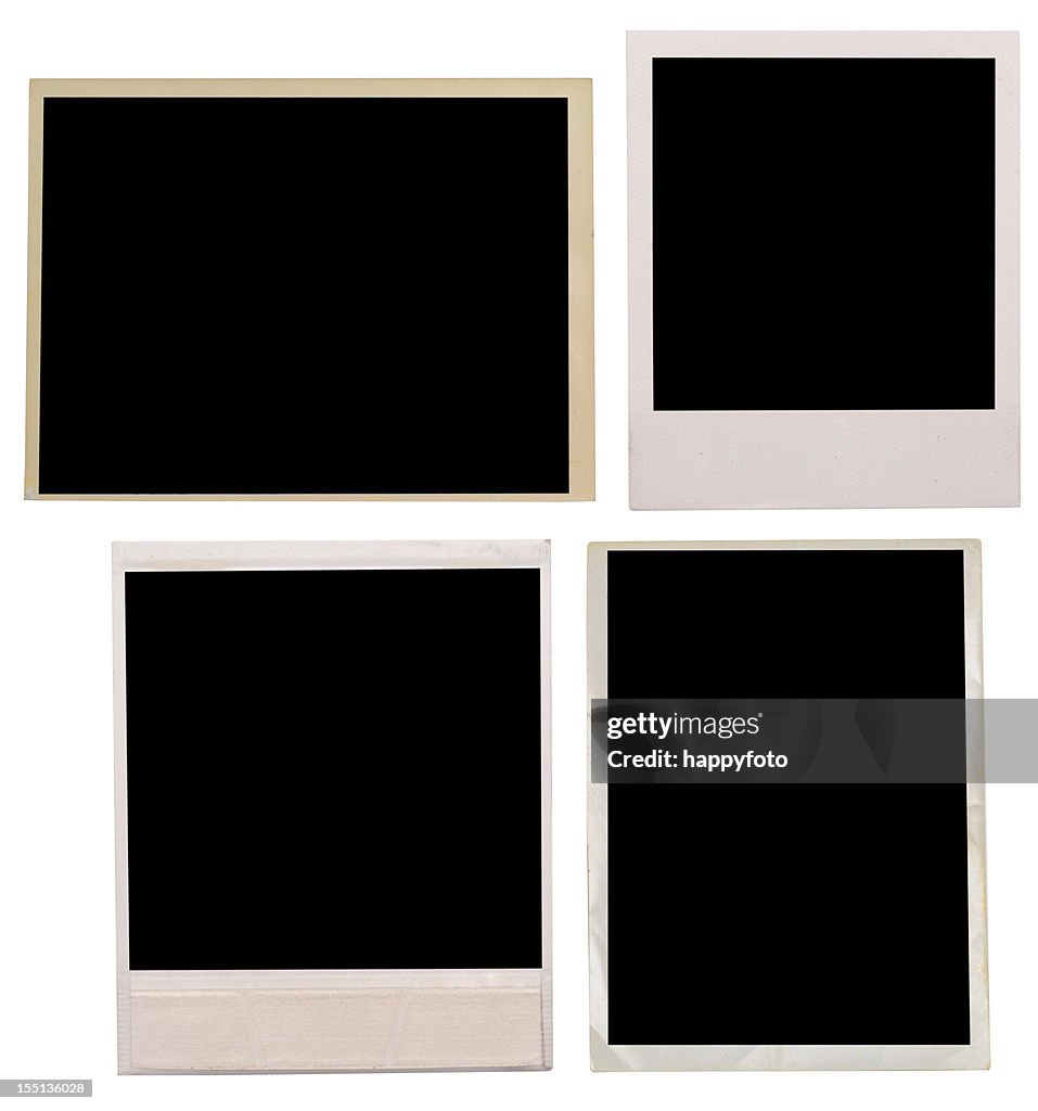 Four blank black old photographs