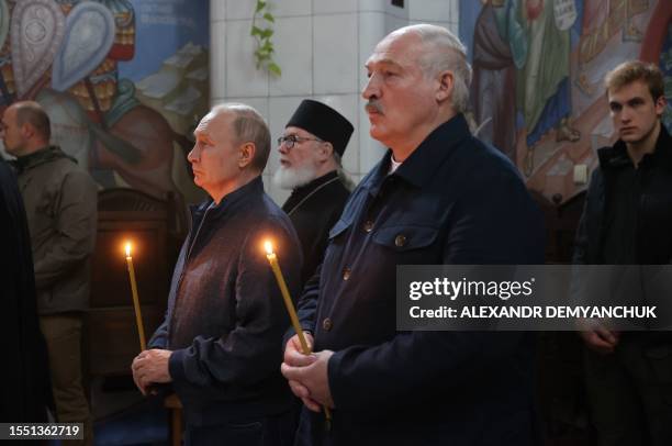 Russian President Vladimir Putin and his Belarus' counterpart Alexander Lukashenko visit the Valaam Monastery on Valaam island in the northern...