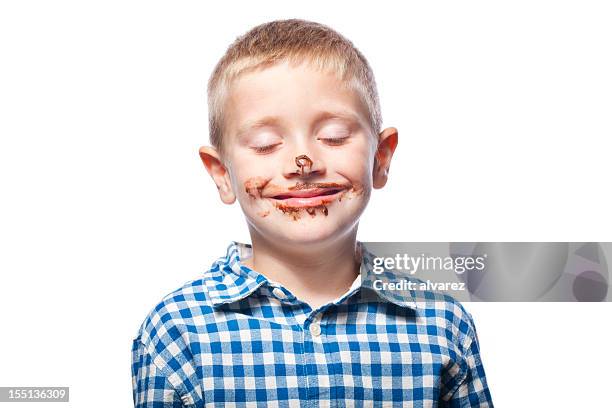 portrait of a child with chocolate - chocolate face stock pictures, royalty-free photos & images
