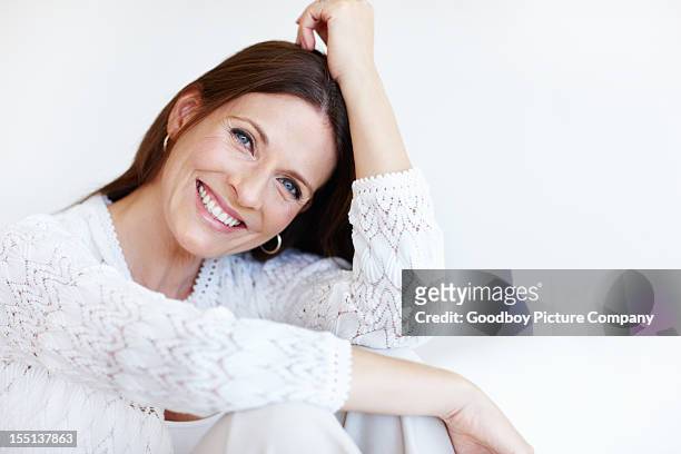 happy woman spending time at home - ziggurat of ur stockfoto's en -beelden