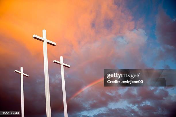 three crosses at sunset - catholic lent stock pictures, royalty-free photos & images
