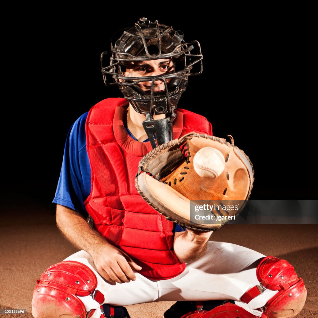 Baseball Player (catcher) at home plate