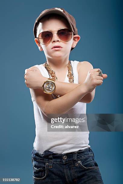 child showing his muscles - rapper stockfoto's en -beelden