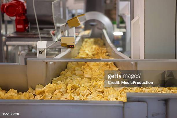crisp factory - food and drink industry stock pictures, royalty-free photos & images