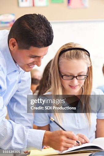 Students Receiving Module High School Student Receiving Instructions From Teacher High-Res Stock ...