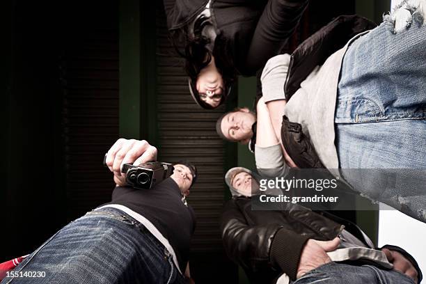 upward view of gang - female gangster stock pictures, royalty-free photos & images