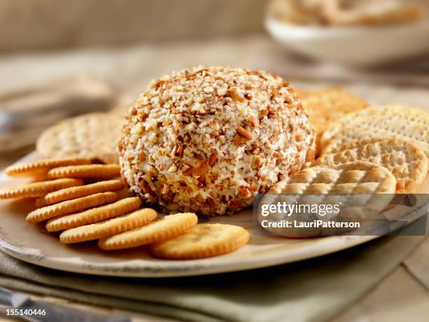 cheese ball with crackers - cheese ball stock pictures, royalty-free photos & images