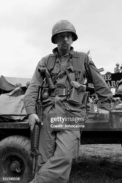 military man in a black and white photo - vietnam war soldiers stock pictures, royalty-free photos & images