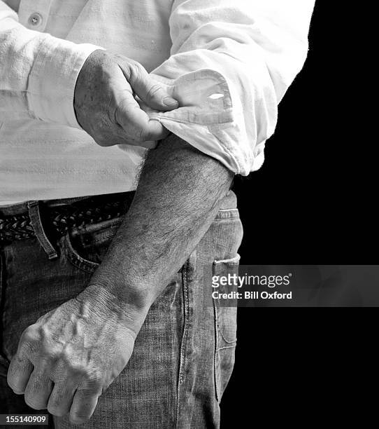 ready for work - rolling up sleeve stock pictures, royalty-free photos & images