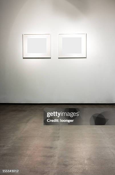 blank frames on the wall at art gallery - gallery 2 stock pictures, royalty-free photos & images