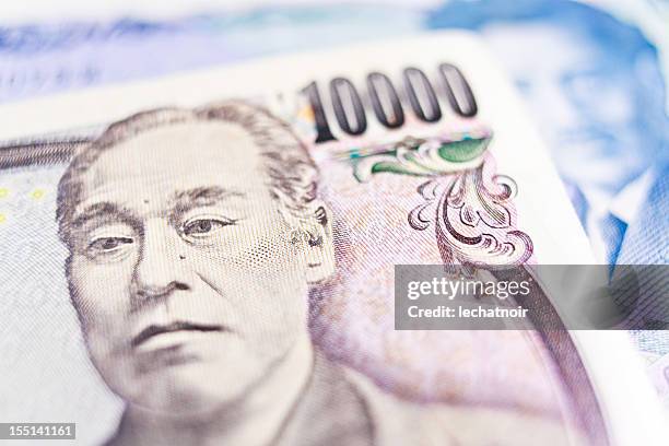 japanese yen banknotes - yen symbol stock pictures, royalty-free photos & images