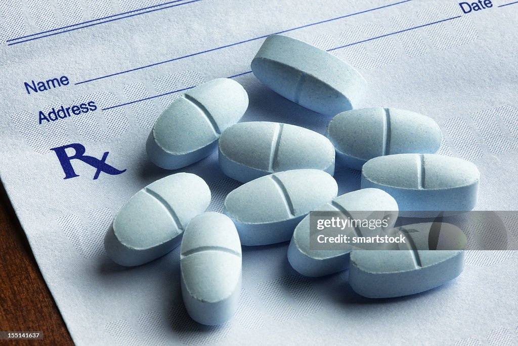 Hydrocodone with Acetaminophen Tablets on a Prescription Form