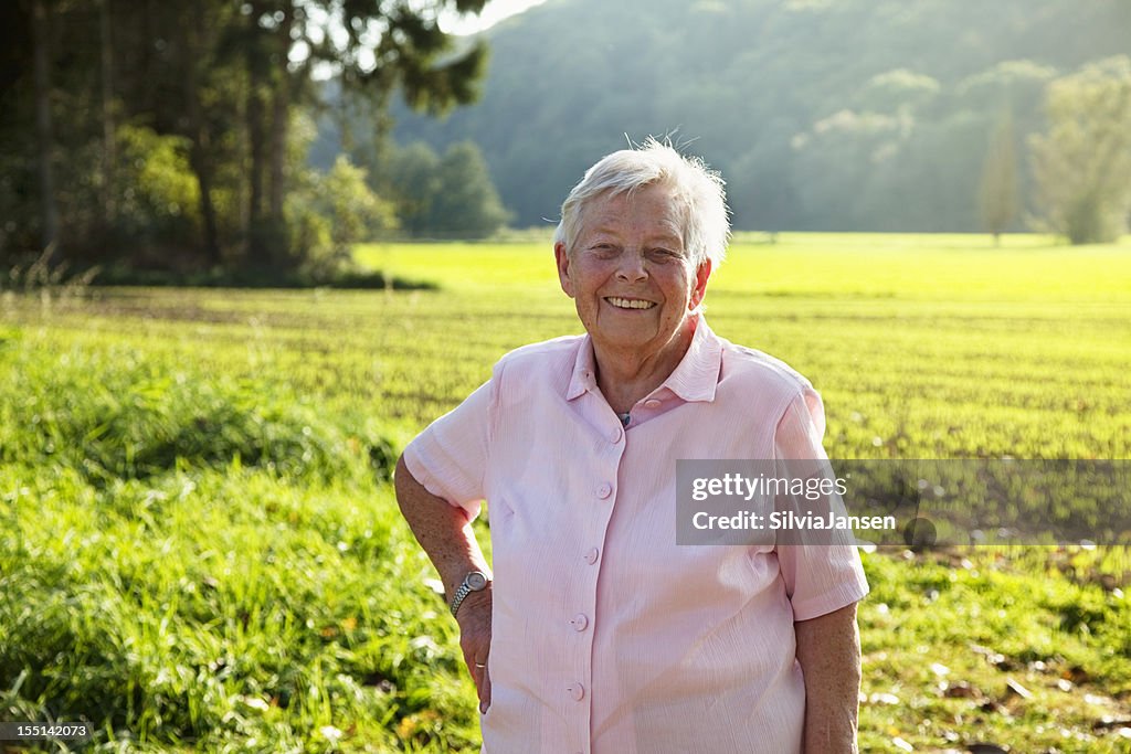 Happy senior woman outdoors