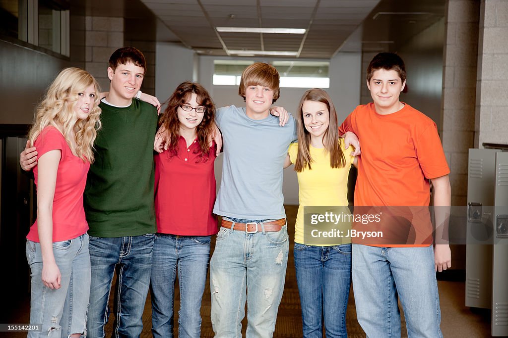 Education: Group Teenage High School Student Friends in Hallway