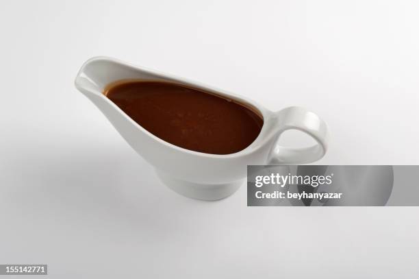 white china gravy boat isolated on white background. - gravy stock pictures, royalty-free photos & images